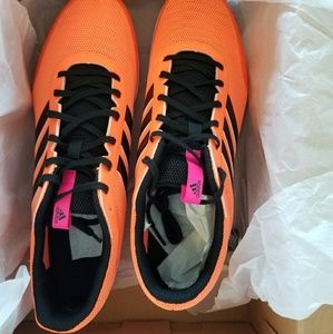 Neon orange Adidas running shoes